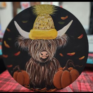 Vaca de las Tierras Altas de otoño, calabazas, cartel de bienvenida,