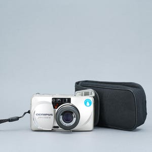 Olympus U mju ZOOM 140 35mm Ultra Compact Camera - Fully Automatic - Self-Timer - Flash - 38-140 zoom lens - Silver - Case