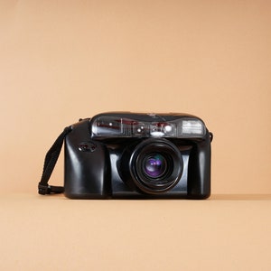 Konica AiBORG Super Zoom 35mm Compact Camera - Fully Automatic - Self-Timer - Flash - 35-105mm Zoom Lens