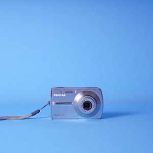 Pentax Optio L 30 Compact Digital Camera - 7.1 Mega Pixels - 3x Optical Zoom Lens - Flash - Self Timer
