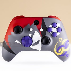 May include: A custom Xbox controller with a gray, red, and white design. The controller has purple buttons and a purple D-pad. The controller has a yellow and purple design on the right side.