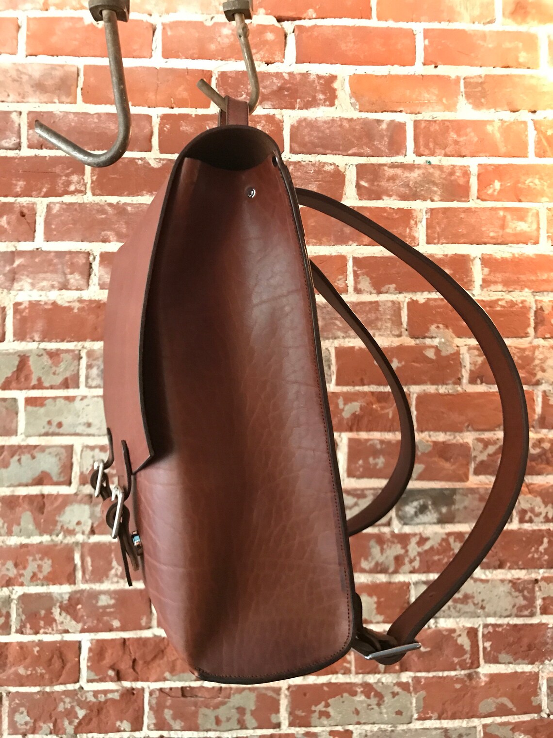 The Old School Backpack with buckles pictured in Whiskey Etsy