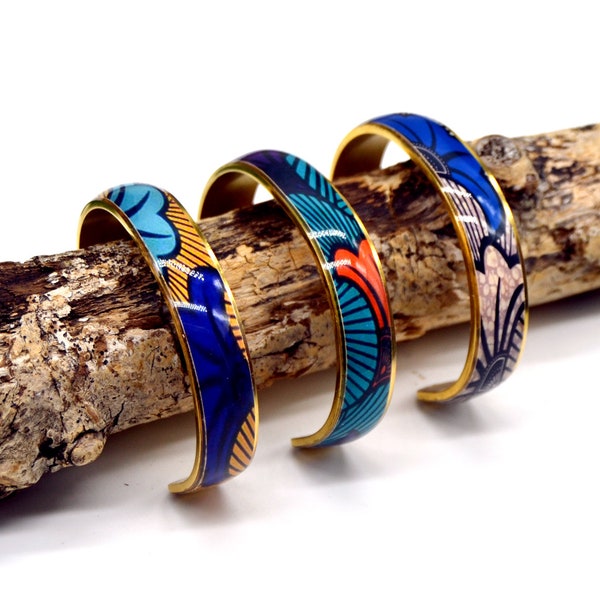 Stainless steel cuff bangle bracelet with ethnic wax pattern and wedding flowers in blue, yellow, orange and gold