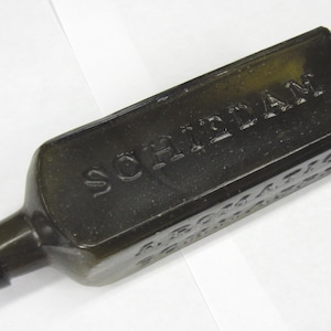 Antique Udolpho Wolfe&#39;s Schnapps Bottle: 1800s Olive Green Glass