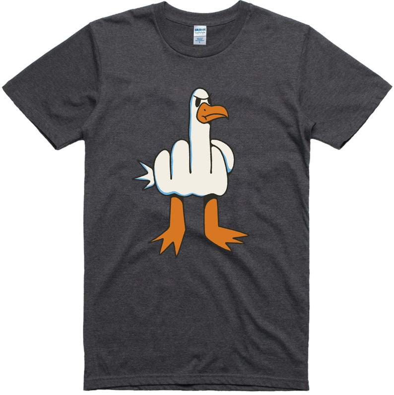 May include: A dark heather grey t-shirt with a cartoon image of a white goose giving the middle finger. The goose has orange feet and a black beak.
