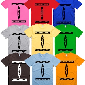May include: Nine t-shirts in different colours, each featuring a black and white crayon design with the word "Crayon" printed vertically on the front.