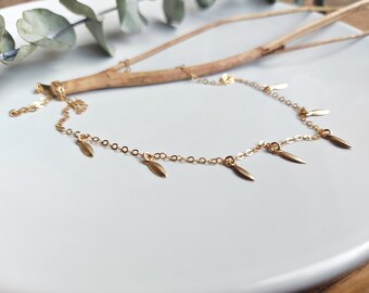 SAGITTA. 14k gold filled necklace with arrow-shaped charms.
