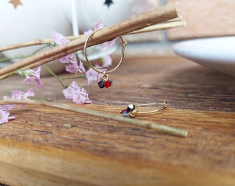 GALAXIA. 14k gold filled hoop earrings with crystal tupis in black, erinite and siam.