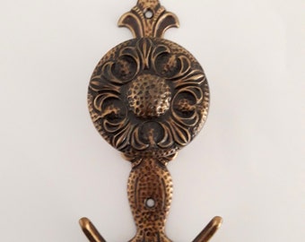 Vintage, brass clothes/hat hook.