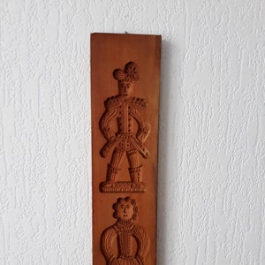 Large gingerbread mold with 2 images.