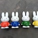 Set of four, vintage Miffy figures from board game, game of goose.