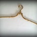 Stylish vintage brass clothes hanger, with vintage patina.