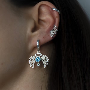 Blue topaz angel huggie hoop, Silver mismatched earring set, Angel or devil wing stud, filigree earrings for her, Set for multiple piercings