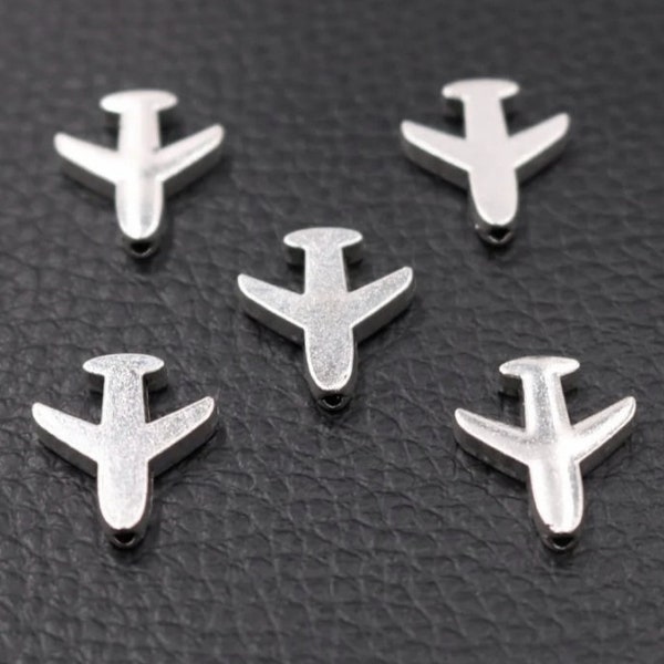 Plane Beads Airplane Beads Aviation Beads Flying Beads Travel Bead Silver Plane Beads Appx 16mm x 13mm. Hole Size is Appx 1.2mm