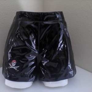 Black pleather shorts with a pirate patch image 1