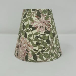 Honeysuckle green and pink candle clip shades in a William Morris design