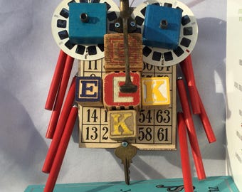 Darius-  whimsical,  wall hanging, bug, Vintage toys, recycle, assemblage sculpture, nursery decor, game pieces