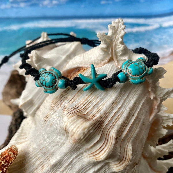 Surf buddies anklet/bracelet. Starfish and a sea turtle adorn this Boho friendship anklet/bracelet in black cord