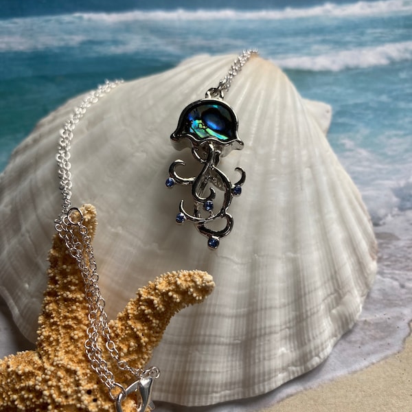 Jellyfish with real abalone shell on a beautiful, silver-plated chain OR shiny black wax cord, 18 inches with pinch clasp.