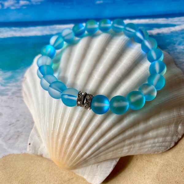 Blue Mermaid Glass, (8mm) Mystic Aura, bracelet. daylight glow, hypnotic-magical hues. Rhinestone accents. Single bracelet.Optional charm