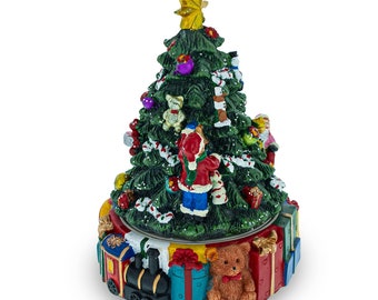 Gifts and Decorations Delight: Spinning Base Musical Figurine with Children Decorating Christmas Tree