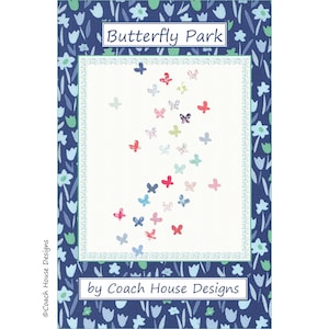 May include: A white background with a blue border featuring a floral pattern. The centre of the image features a white square with a blue border and a pattern of colourful butterflies. The text "Butterfly Park" is at the top of the image and "by Coach House Designs" is at the bottom.