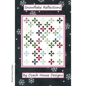 May include: A quilt pattern called "Snowflake Reflections" by Coach House Designs. The pattern features a white background with a repeating pattern of red, green, and black snowflake-like shapes.