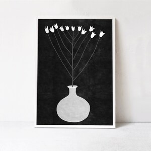 May include: A black and white illustration of a vase with white flowers. The vase is round and has a short neck. The flowers are simple and stylized.