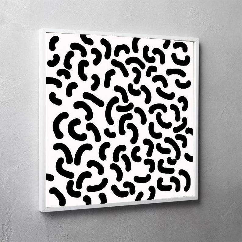 Puede incluir: Impresi&oacute;n de arte abstracto en blanco y negro con un patr&oacute;n de formas curvas que se asemejan a garabatos o gusanos. La impresi&oacute;n est&aacute; enmarcada en un marco blanco.