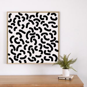 Puede incluir: Impresi&oacute;n de arte abstracto en blanco y negro con marco dorado. La impresi&oacute;n presenta un patr&oacute;n de formas curvas.