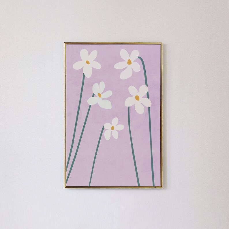 May include: A framed print with a light purple background and five white flowers with yellow centers. The flowers are stylized and have green stems.