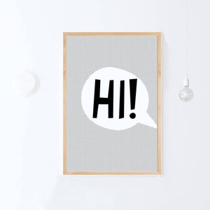 May include: A framed print with a white background and a black speech bubble that says "HI!" in bold letters. The background is a gray and white pattern.