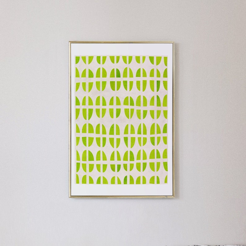 May include: A framed print with a geometric pattern of green circles and white lines on a white background.