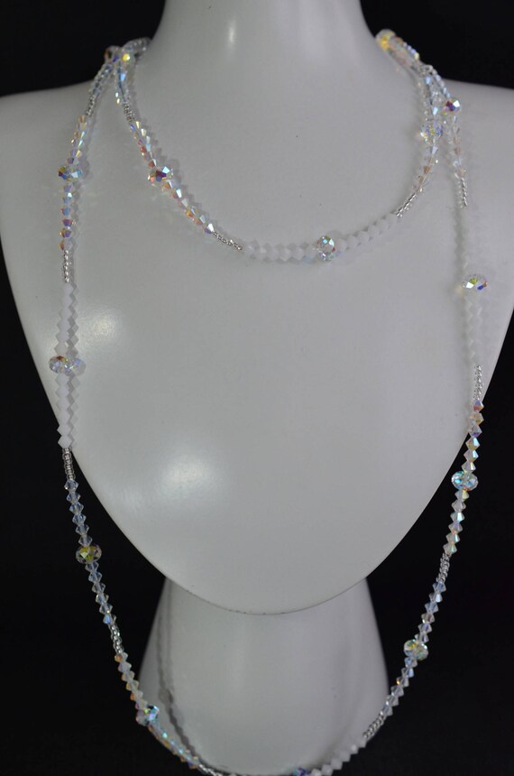 **25 perles toupies 4 mm SWAROVSKI CRYSTAL MOONLIGHT 5328 **