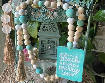Handmade Coastal Wood Bead Garland: Beach Decor with Jute Tassel