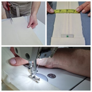 May include: A close-up of a sewing machine stitching a white fabric with a green leaf logo. The fabric is being held in place by a hand. The sewing machine is on a white surface.