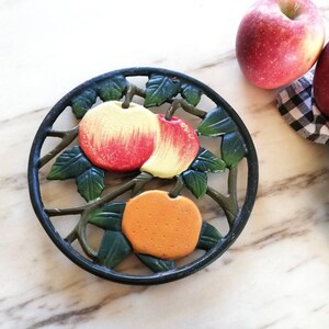 Cast iron trivet with apple motif, vintage French country, table decor, trivet