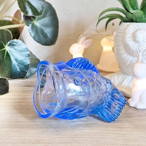 Small blue glass jar/vase in the shape of a fish, decorative fish figurine