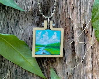 Hand painted one of a kind necklace. Miniature painting. Nature. Meadow and stream.