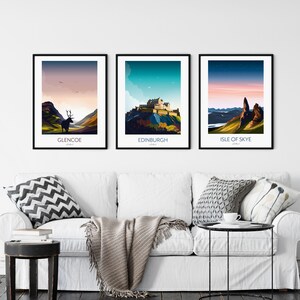 May include: Three framed prints of Scottish landscapes. The first print shows a silhouette of a deer in the Scottish Highlands. The second print shows Edinburgh Castle. The third print shows the Old Man of Storr on the Isle of Skye.