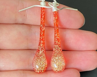 orange colored earrings 1980