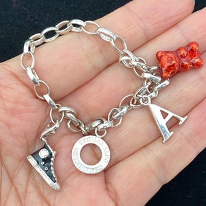 Bracelet Thomas Sabo d'occasion avec breloques chaussure ours lettre A