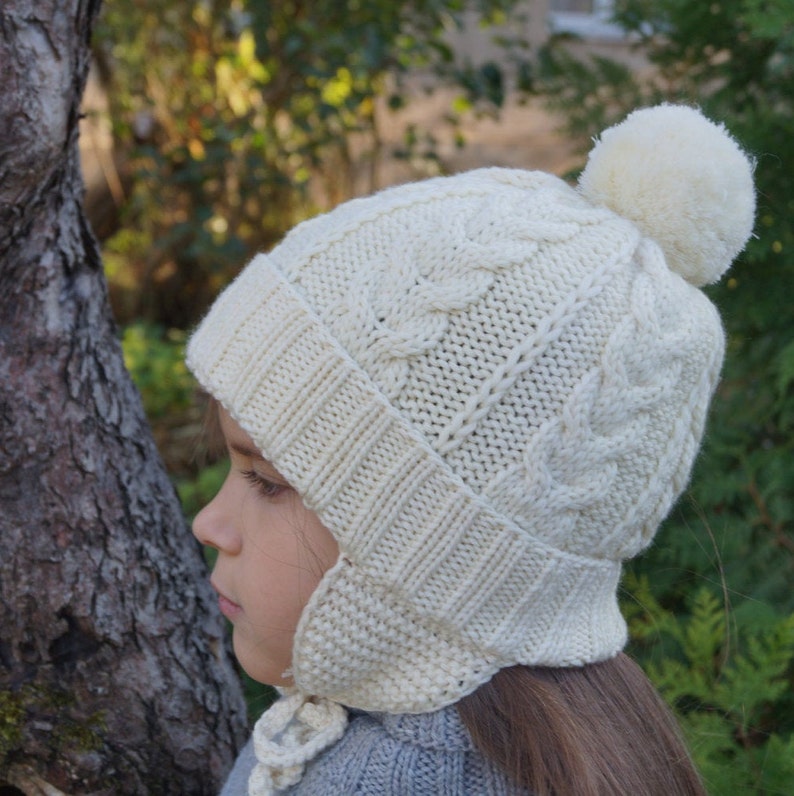 Pom pom beanie with ear flaps.Knitted girls/boys hat.Baby/toddler/child/teens knitted Hat.White hat.Hand knit merino hat.Winter Hat. image 4