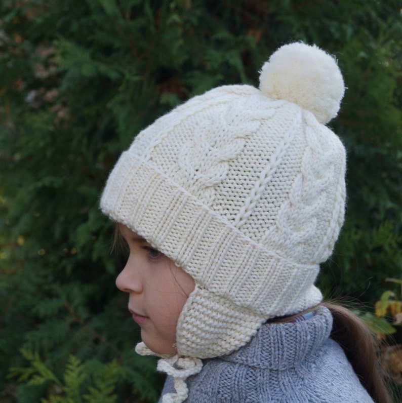 Pom pom beanie with ear flaps.Knitted girls/boys hat.Baby/toddler/child/teens knitted Hat.White hat.Hand knit merino hat.Winter Hat. image 3