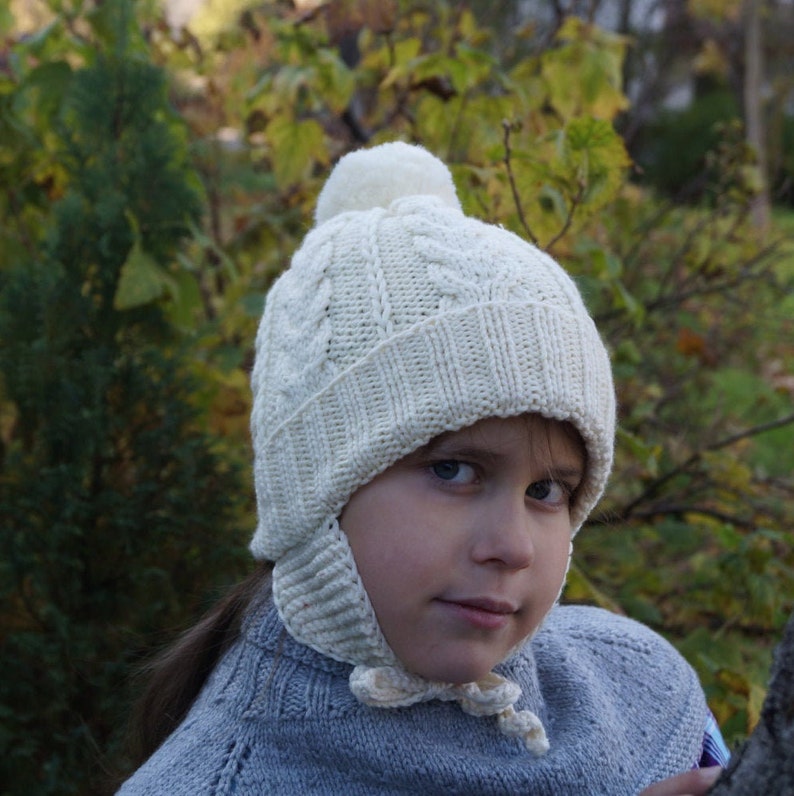 Pom pom beanie with ear flaps.Knitted girls/boys hat.Baby/toddler/child/teens knitted Hat.White hat.Hand knit merino hat.Winter Hat. image 2