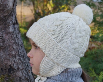 Pom pom beanie with  ear flaps.Knitted girls/boys hat.Baby/toddler/child/teens knitted Hat.White hat.Hand knit merino hat.Winter Hat.