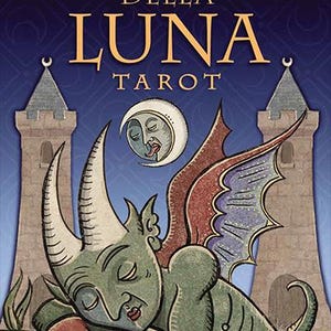 May include: A tarot card illustration featuring a sleeping sea creature with horns, wings, and a crab claw. The card is titled "Trionfi Della Luna Tarot" with text at the top and bottom. The background includes two towers and a crescent moon.
