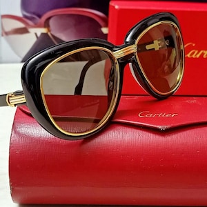Excellent Authentic Cartier Conquete Sunglasses C. Black & Gold boxed Authentic  Cartier Lenses