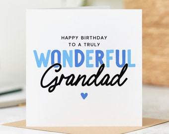 Könnte beinhalten: Eine weiße Karte mit blauem und schwarzem Text, der "Happy Birthday to a Truly Wonderful Grandad" lautet. Unter dem Text befindet sich ein kleines blaues Herz.