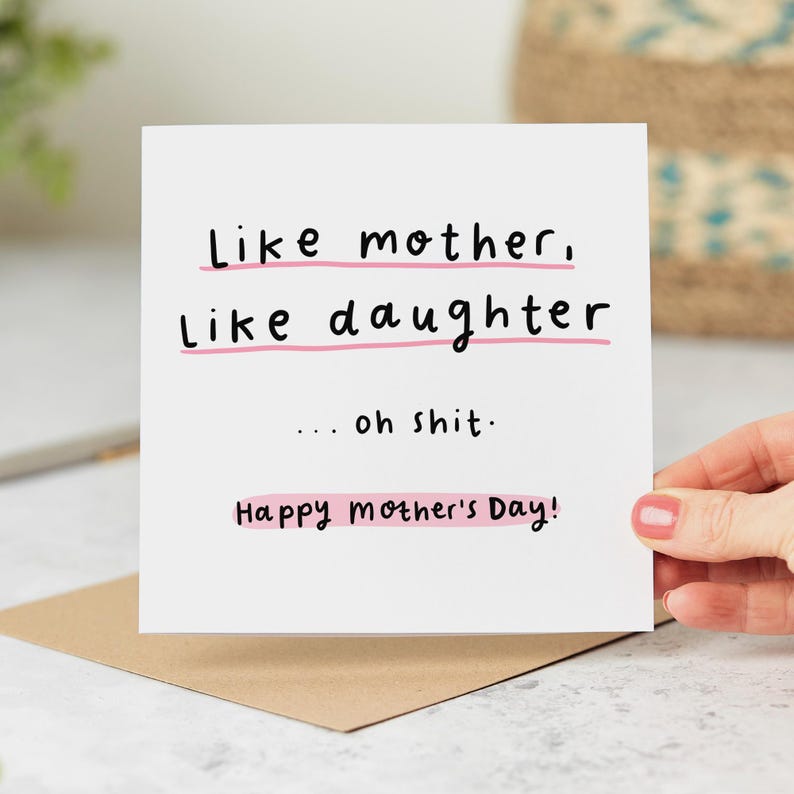 Square white Mother's Day card with black text and pink highlights reading Like mother, Like daughter... oh shit Happy Mother's Day